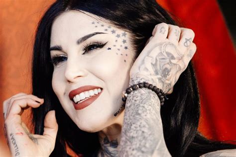 kat von d leg tattoos|Kat Von D is covering most of her tattoos with solid black ink.